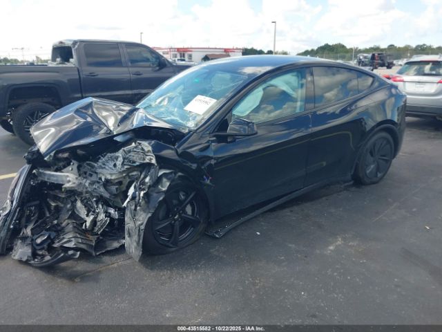 2026 TESLA MODEL Y 7SAYGDEDXTA471015 Photo 1