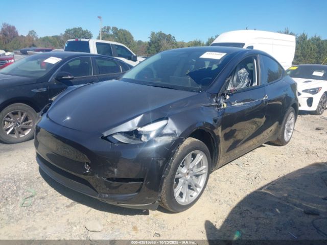 2024 TESLA MODEL Y 7SAYGDED0RF005489 Photo 1
