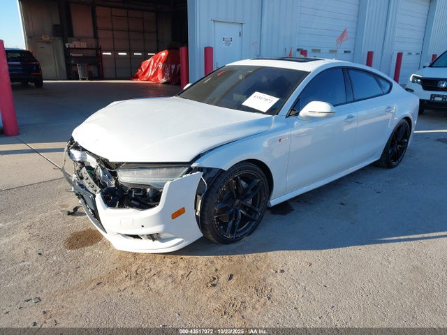 2016 AUDI A7 WAUWGAFC2GN081459 Photo 1