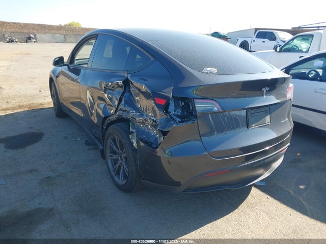 2025 TESLA MODEL Y 7SAYGAEE5SF252696 Photo 2