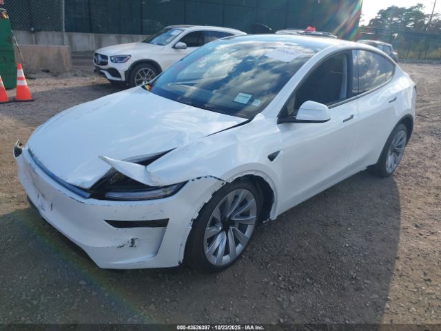 2026 TESLA MODEL Y 7SAYGDEEXTA471024 Photo 1