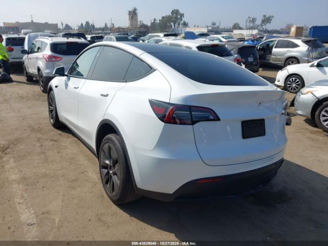 2024 TESLA MODEL Y 7SAYGDED5RF111095 Photo 2