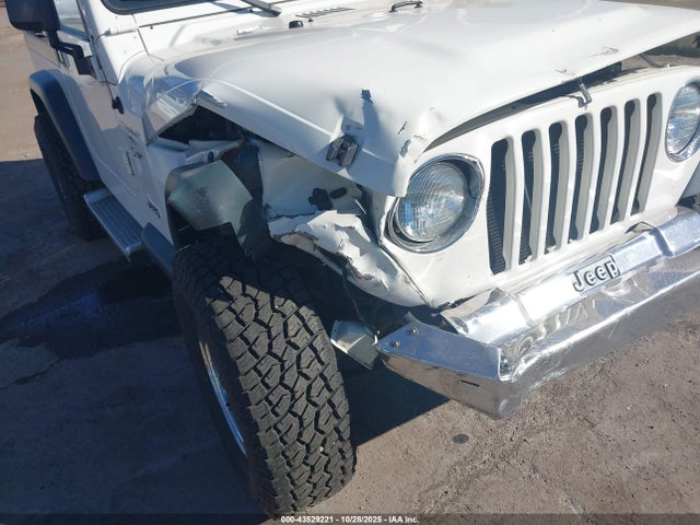 Auction sale of the 2000 Jeep Wrangler Sport, vin: 1J4FA49S6YP748610, lot number: 43529221