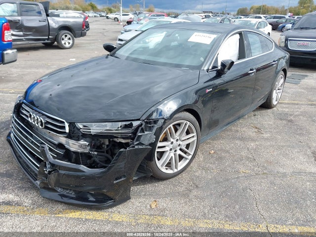 2016 AUDI A7 WAUWGAFC9GN010775 Photo 1