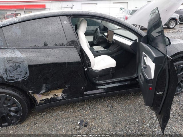 2022 TESLA MODEL Y 7SAYGDEE6NF340050 Photo 4