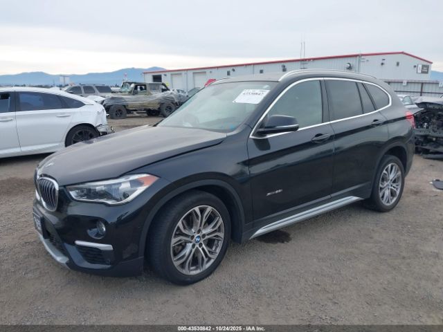 2017 BMW X1 WBXHT3Z30H4A52084 Photo 1