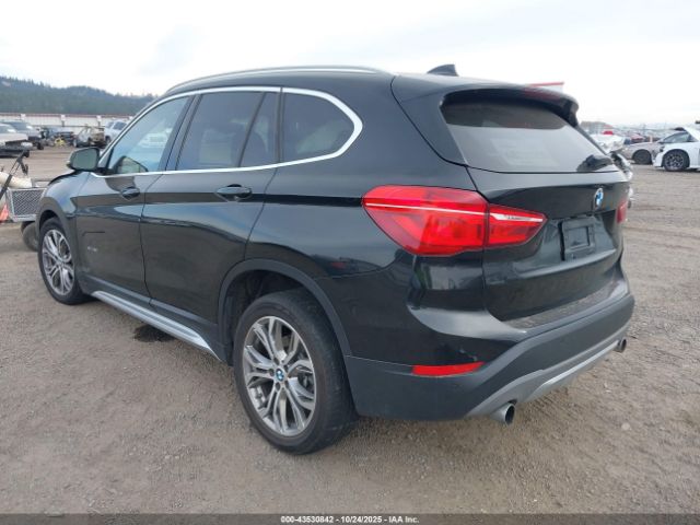 2017 BMW X1 WBXHT3Z30H4A52084 Photo 2