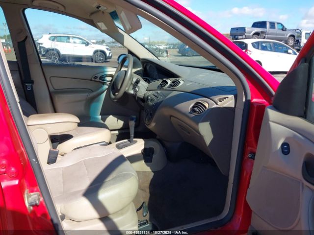 2003 FORD FOCUS 1FAFP34Z23W323554 Photo 4