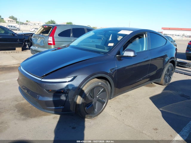 2026 TESLA MODEL Y 7SAYGDED9TA490011 Photo 1