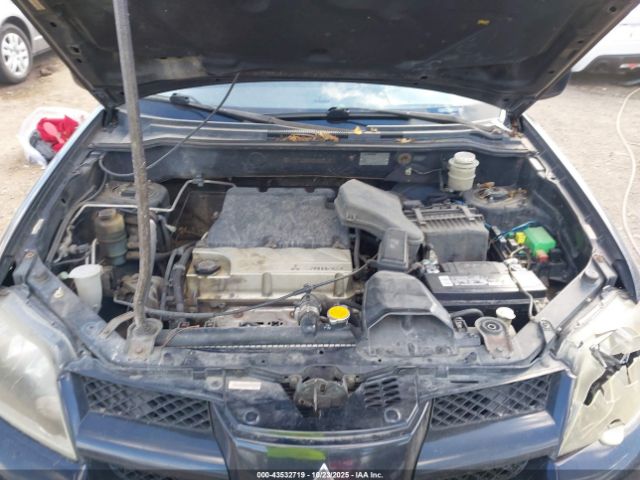 2004 MITSUBISHI OUTLANDER JA4LZ31F74U053214 Photo 9