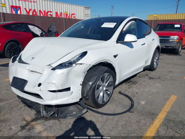 2023 TESLA MODEL Y 7SAYGAEEXPF591848 Photo 1