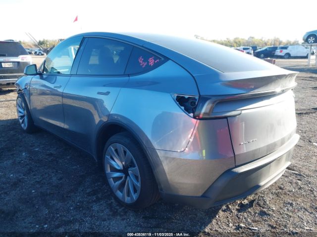 2026 TESLA MODEL Y 7SAYGDEEXTF322678 Photo 2