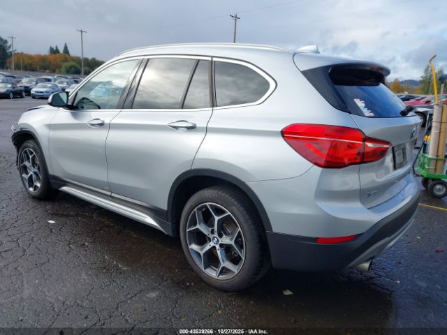 2019 BMW X1 WBXHT3C58K5L38659 Photo 2