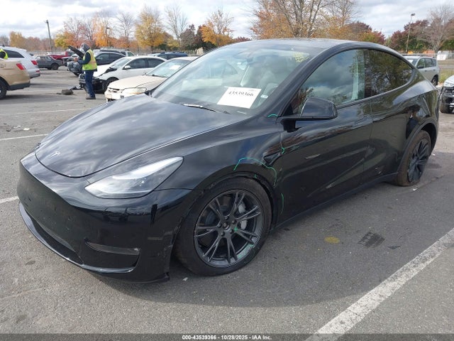 2025 TESLA MODEL Y 7SAYGDEE0SF287051 Photo 1