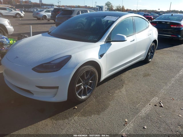 2023 TESLA MODEL 3 5YJ3E1EA8PF509335 Photo 1