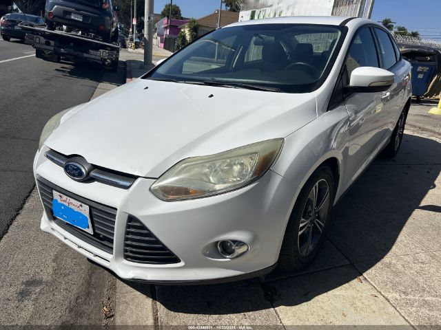 2014 FORD FOCUS 1FADP3F24EL407533 Photo 1