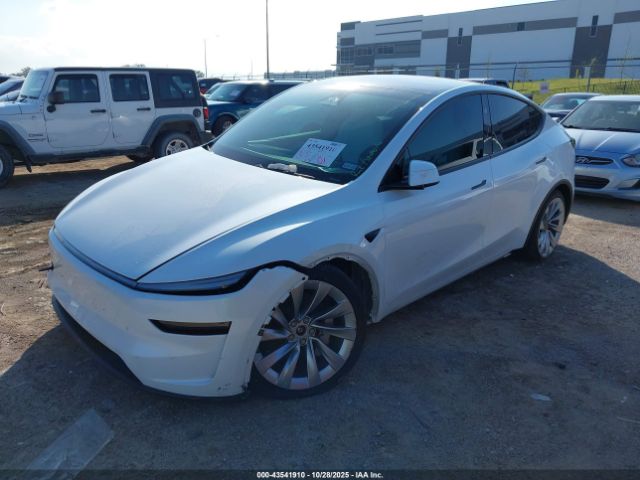 2026 TESLA MODEL Y 7SAYGDEE5TA381442 Photo 1