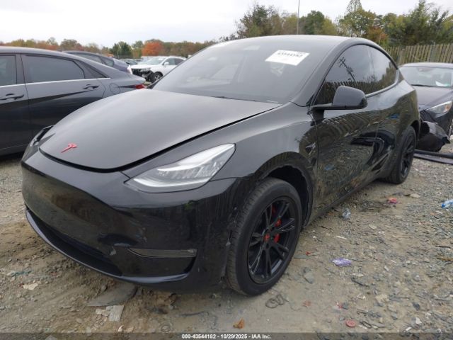 2022 TESLA MODEL Y 7SAYGAEE2NF307710 Photo 1