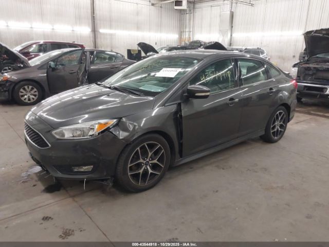 2015 FORD FOCUS 1FADP3F29FL348626 Photo 1