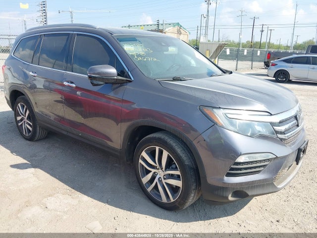 Honda Pilot Touring 2017 5FNYF6H93HB026712 zdjęcie główne