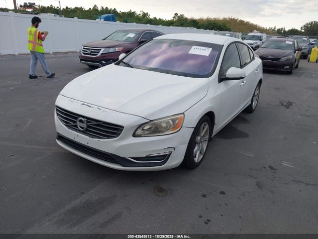 2014 VOLVO S60 YV1612FS0E2296834 Photo 1