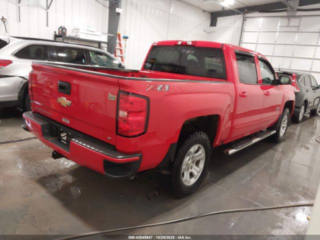 2018 CHEVROLET SILVERADO 1500 3GCUKREC2JG412470 Photo 3