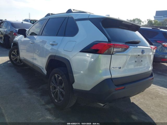 2024 TOYOTA RAV4 HYBRID JTMB6RFV7RD550381 Photo 2