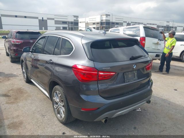 2017 BMW X1 WBXHT3Z33H4A65220 Photo 2