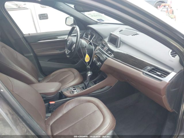 2017 BMW X1 WBXHT3Z33H4A65220 Photo 4