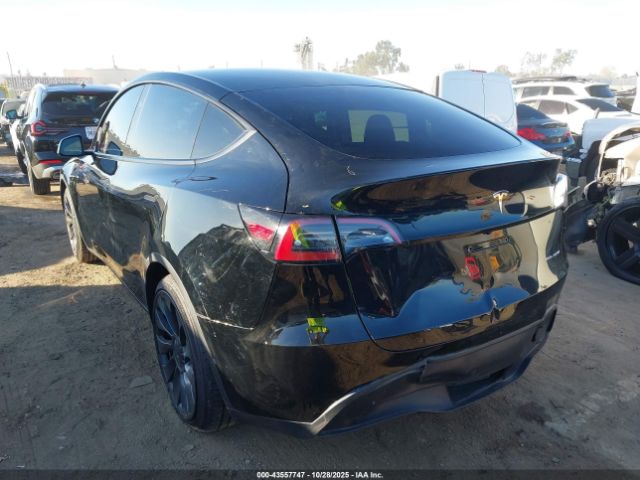 2023 TESLA MODEL Y 7SAYGDEF9PF833099 Photo 2