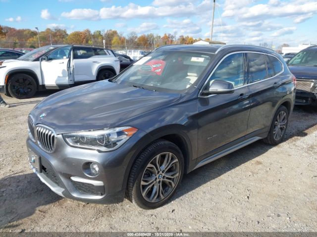 2017 BMW X1 WBXHT3Z36H4A58469 Photo 1
