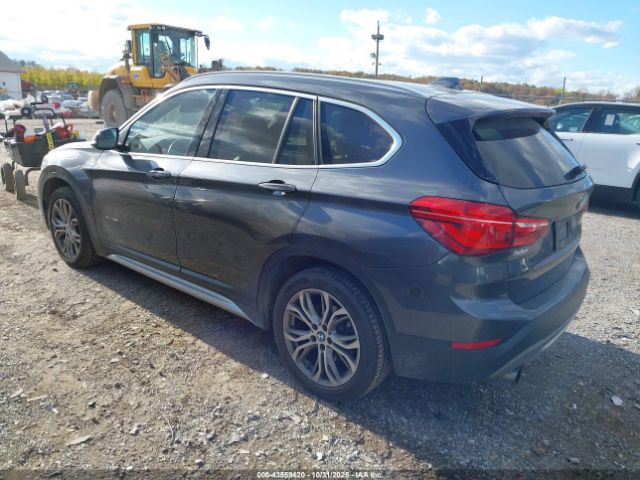 2017 BMW X1 WBXHT3Z36H4A58469 Photo 2