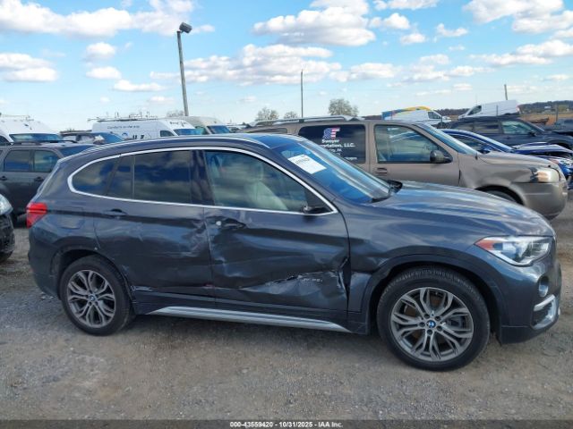 2017 BMW X1 WBXHT3Z36H4A58469 Photo 5