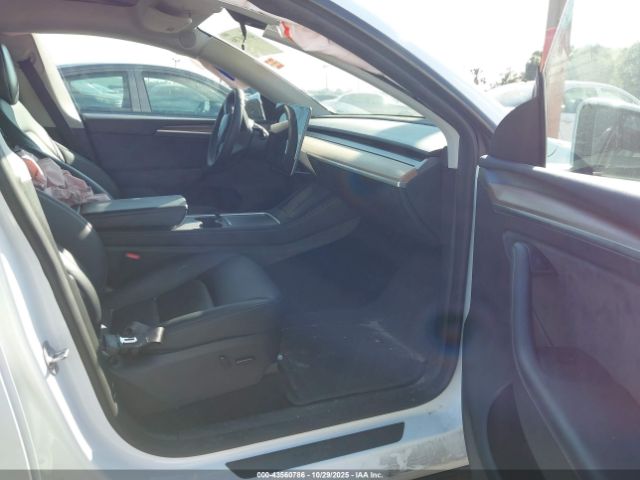 2023 TESLA MODEL Y 7SAYGDED4PF931973 Photo 4