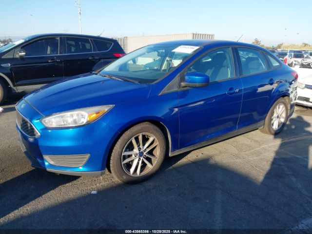 2018 FORD FOCUS 1FADP3FEXJL304041 Photo 1