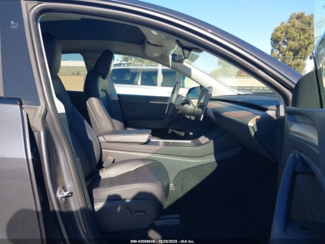 2023 TESLA MODEL Y 7SAYGDED5PF980101 Photo 4