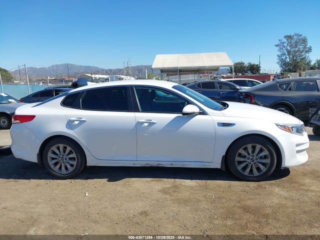5XXGT4L33JG264428 KIA Optima Lx