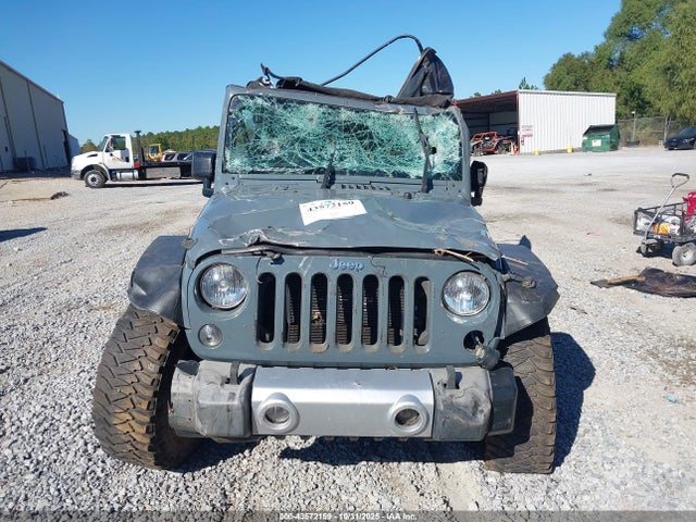 1C4AJWAG9FL553446 Jeep Wrangler Sport