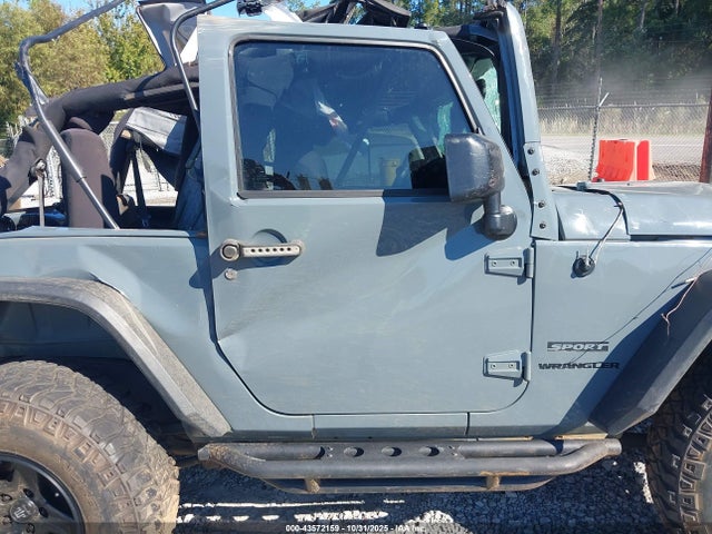 1C4AJWAG9FL553446 Jeep Wrangler Sport