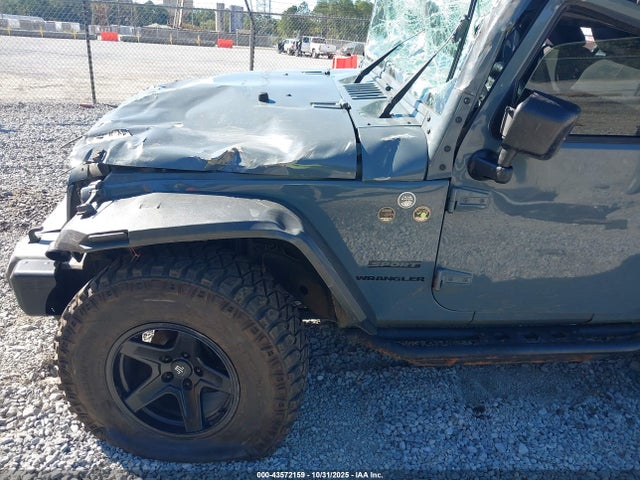 1C4AJWAG9FL553446 Jeep Wrangler Sport