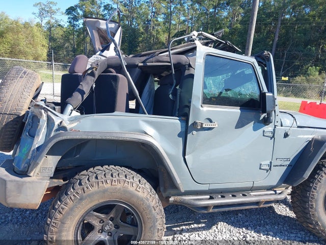 1C4AJWAG9FL553446 Jeep Wrangler Sport