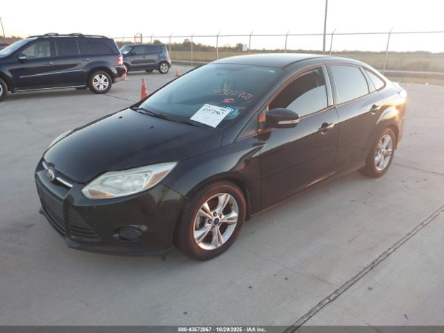 2014 FORD FOCUS 1FADP3F22EL195862 Photo 1