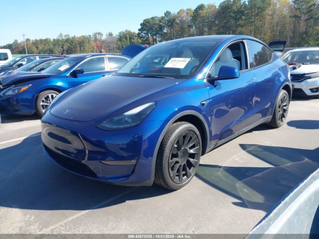 2023 TESLA MODEL Y 7SAYGDEE6PF804134 Photo 1