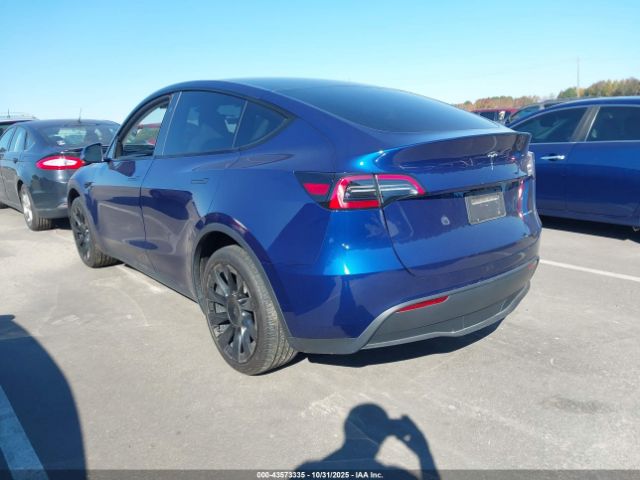 2023 TESLA MODEL Y 7SAYGDEE6PF804134 Photo 2