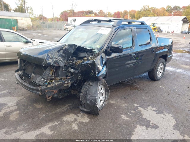 2011 HONDA RIDGELINE 5FPYK1F44BB002245 Photo 1