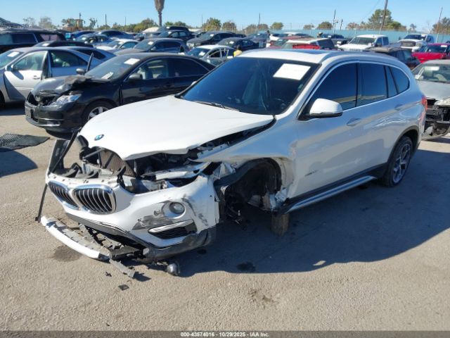 2017 BMW X1 WBXHT3C31H5F71261 Photo 1