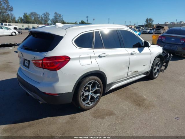 2017 BMW X1 WBXHT3C31H5F71261 Photo 3