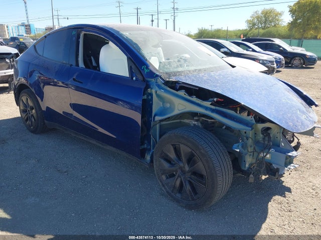 2024 TESLA MODEL Y 7SAYGDEE7RA323793 Photo 0