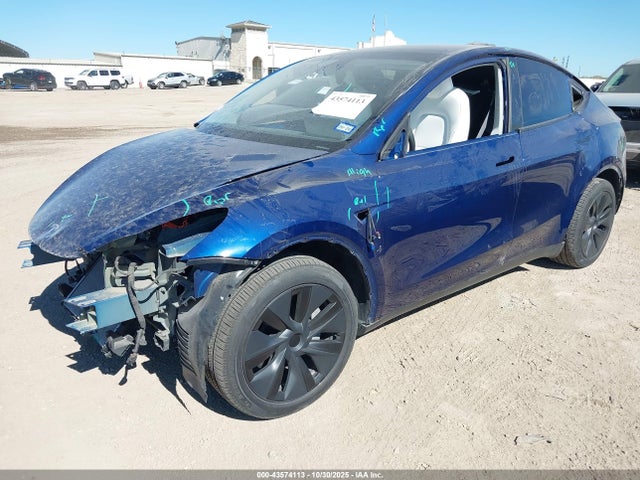 2024 TESLA MODEL Y 7SAYGDEE7RA323793 Photo 1