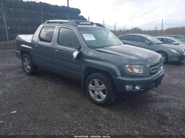 2011 HONDA RIDGELINE 5FPYK1F57BB010400
